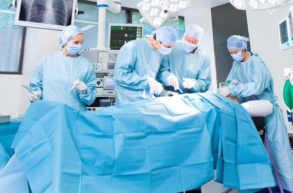 Concentrating surgeons performing operation in operating room